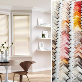 A kitchen seating area showcasing pleated shades on the windows and a selection of paint samples. 